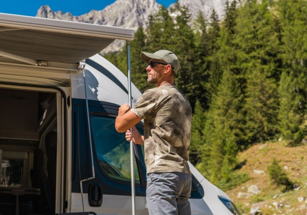 Customer reviewing clear price quote with RV technician before awning repair begins