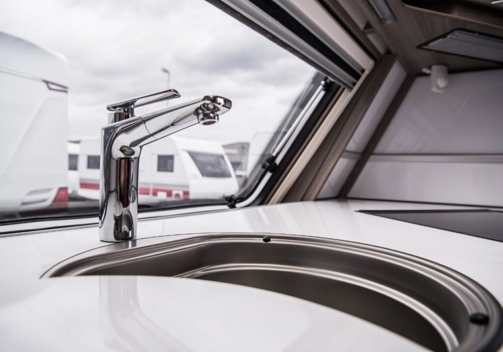 Technician showing clear, written repair estimate to RV owner at local park