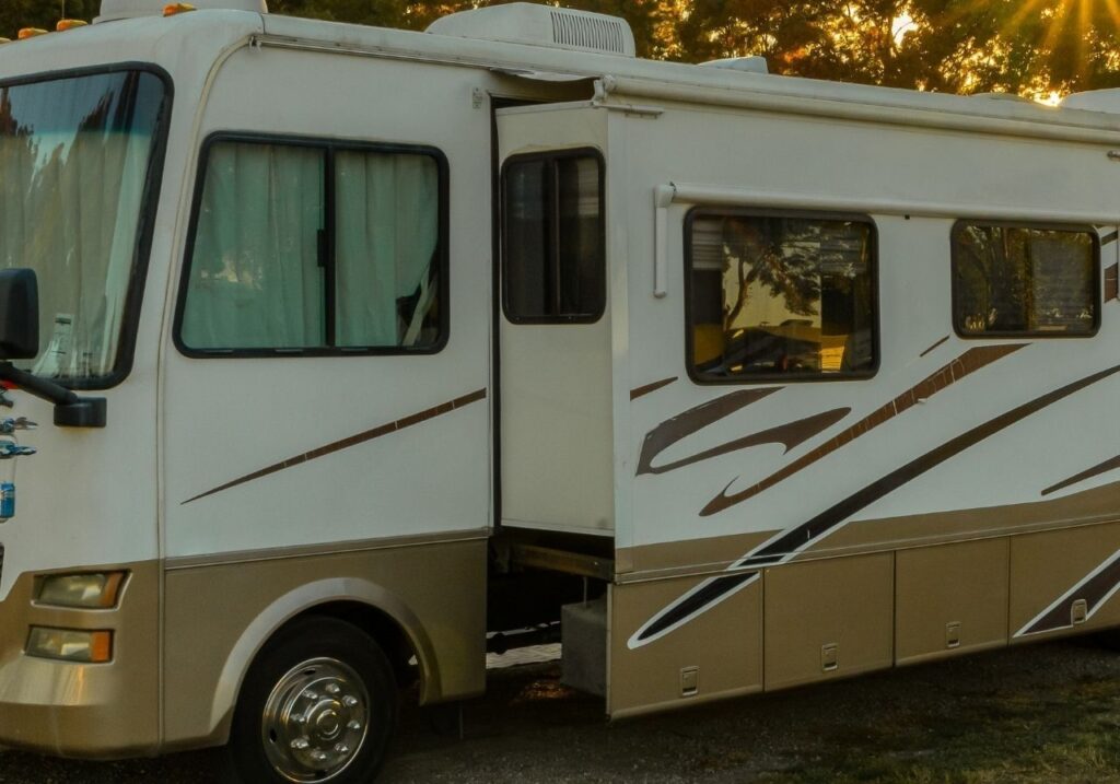 RV parked roadside with mobile repair van arriving for same-day service