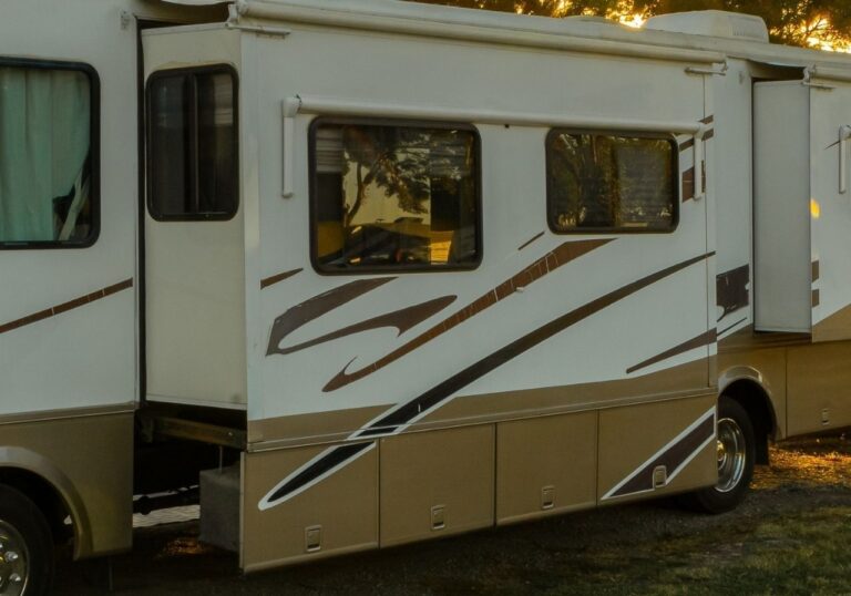 RV technician working in the Vegas heat near Lake Mead with tools ready